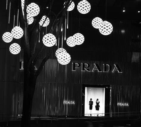 prada brand mission.